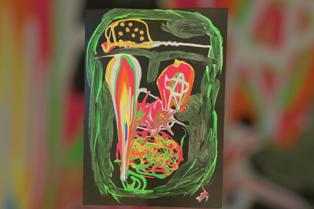 AKASHIが描いた、黒い画用紙に色を垂らして描いた作品「とろける目」。鮮やかな色彩が滲み、幻想的に広がっている。